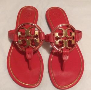 Tory Burch metal Miller sandals.